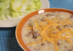Cheeseburger Soup with extra cheese on top