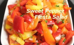 Orange, red, yellow sweet pepper salad