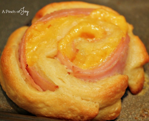 Ham and Cheese Pinwheel out of the oven -- A Pinch of Joy